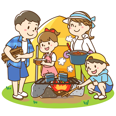 キャンプ料理を作る家族